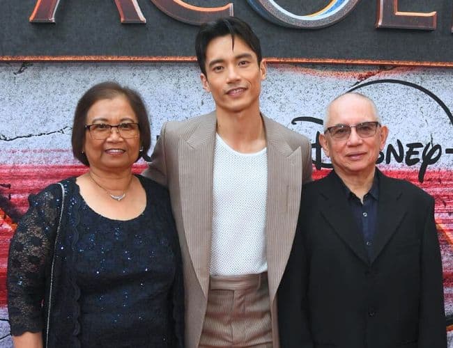 Manny Jacinto with mom and dad