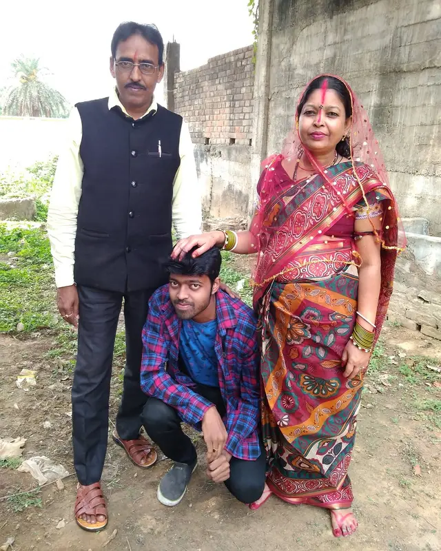 Adarsh Anand old photo with mom and dad