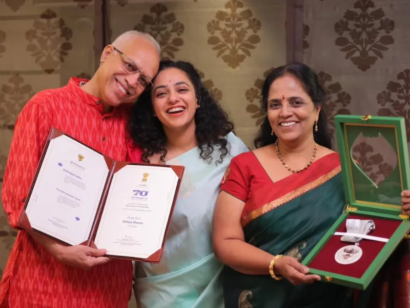 Nithya Menen and her parents with the National Award