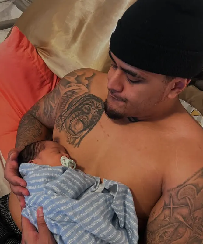 Zilla Fatu with his son