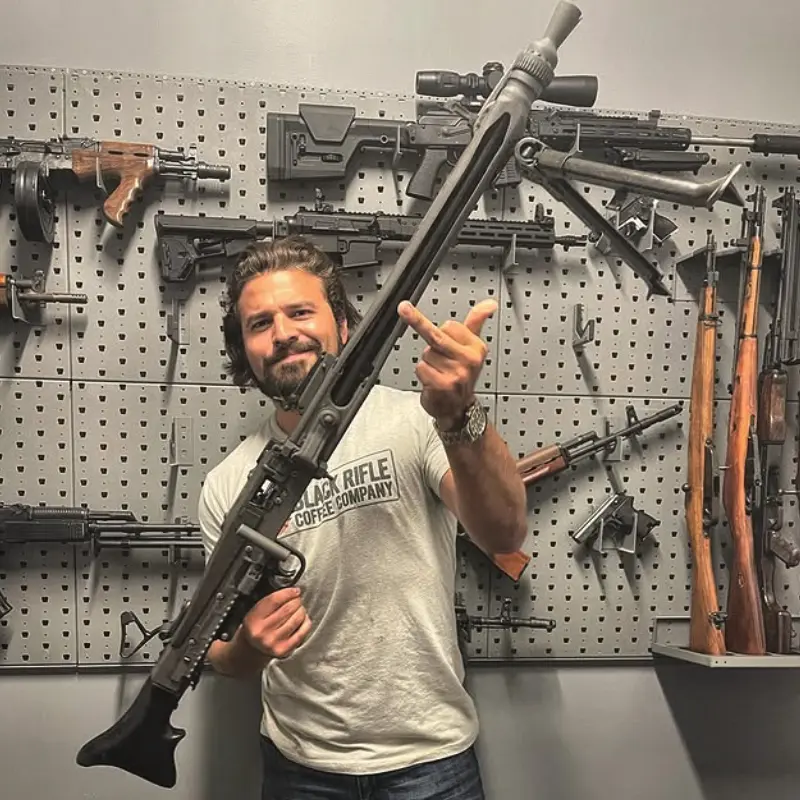 Brandon Herrera with guns