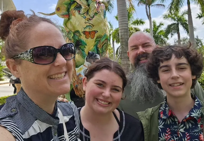 Kue Lawrence with family