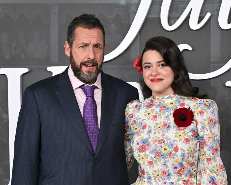Adam Sandler and Grace Edwards attend the Los Angeles Premiere of Netflix's Jay Kelly at The Egyptian Theatre Hollywood