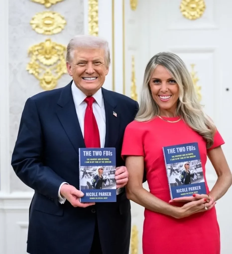 Nicole parker and Donald Trump With her Book The Two FBIs