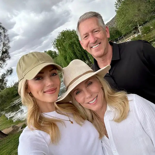 Abby Hornacek with Mom and Dad