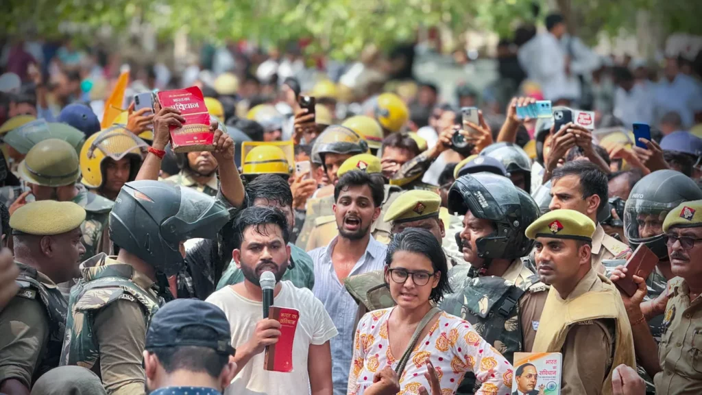 Neha Bora and Abhijeet Dipke amid heavy police presence during the Jantar Mantar protest