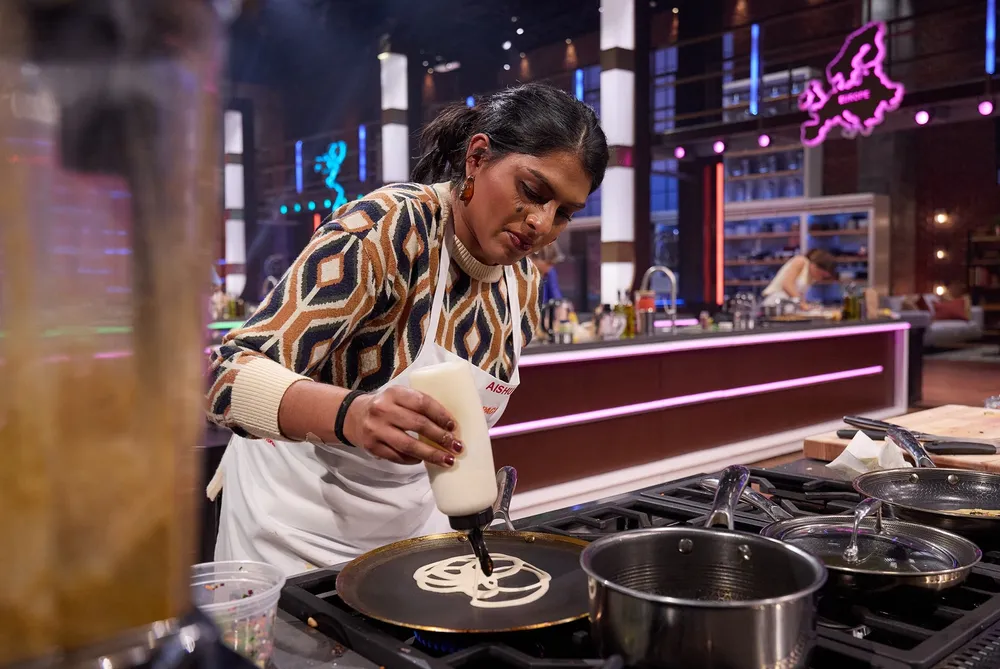 Aishu Challa Leitz (MasterChef) Biography - Age, Family 1 Aishu Challa prepares a dish during the MasterChef Global Gauntlet competition