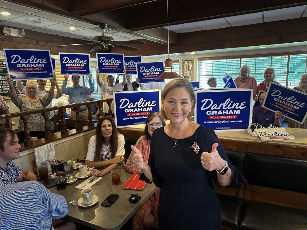 Darline Graham Biography - Husband, Age, Background 1 U.S. Senator Darline Graham meeting supporters and Lexington County Sheriff Jay Koon at Lizard's Thicket ahead of the primary election