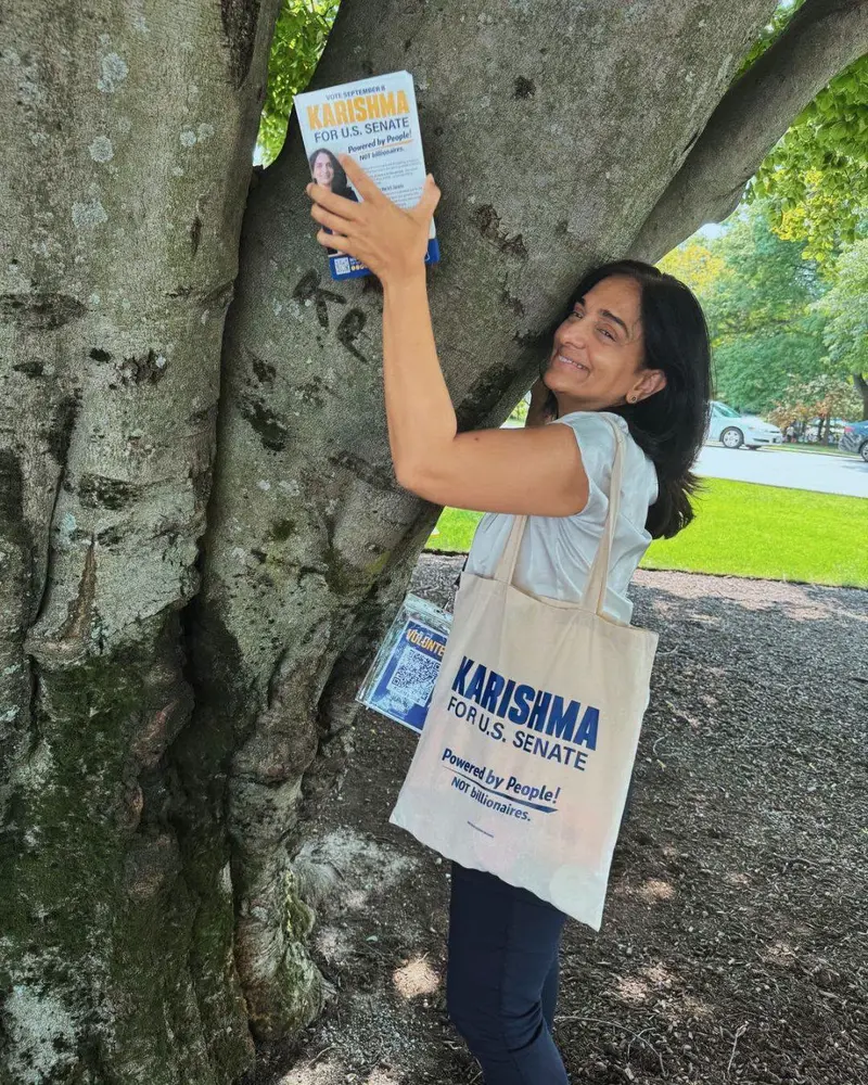 Karishma Manzur Hugging a Tree with Her Campaign Tote Bag while Canvassing for the U.S. Senate in New Hampshire