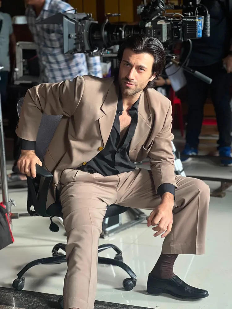 Rohed Khan striking a stylish pose on set between film shoots in Mumbai