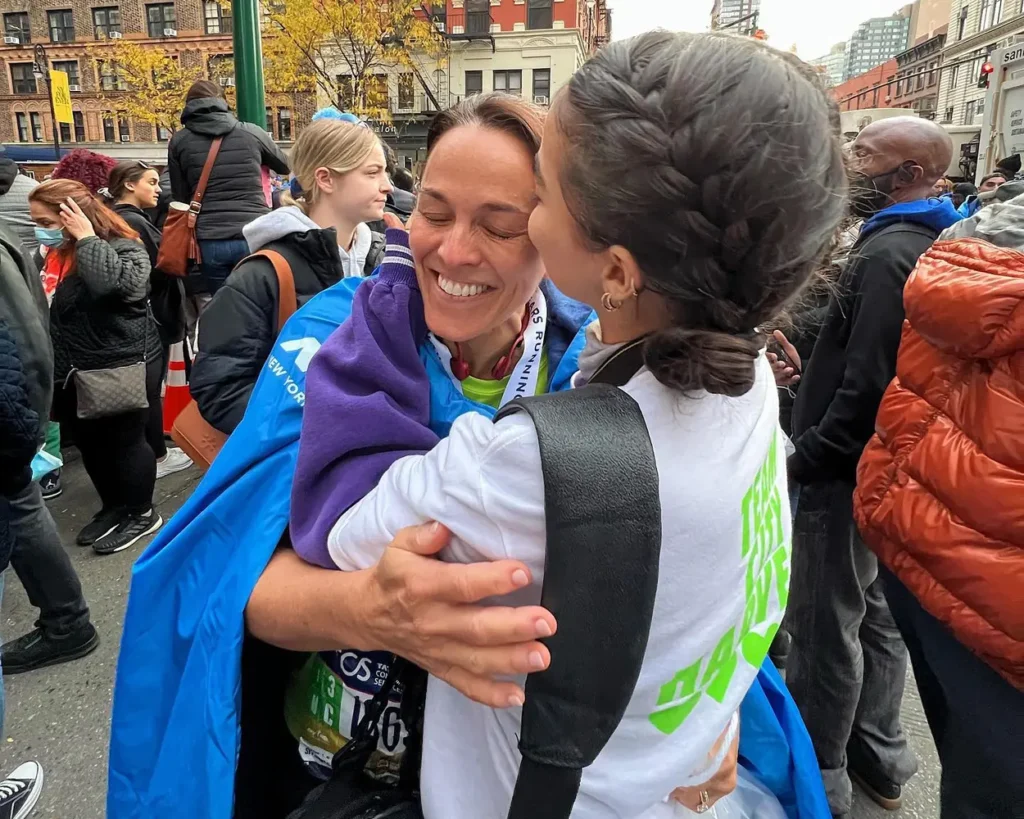 Sarah Jane Nader hugging her mother, Holland Nader, after she finished the New York City Marathon