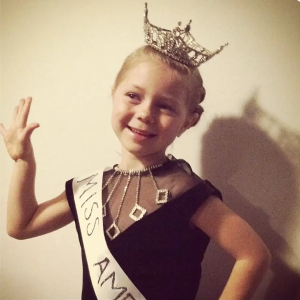 Young Hailey Bills Strikes a Pose in Her Childhood Miss America Halloween Costume